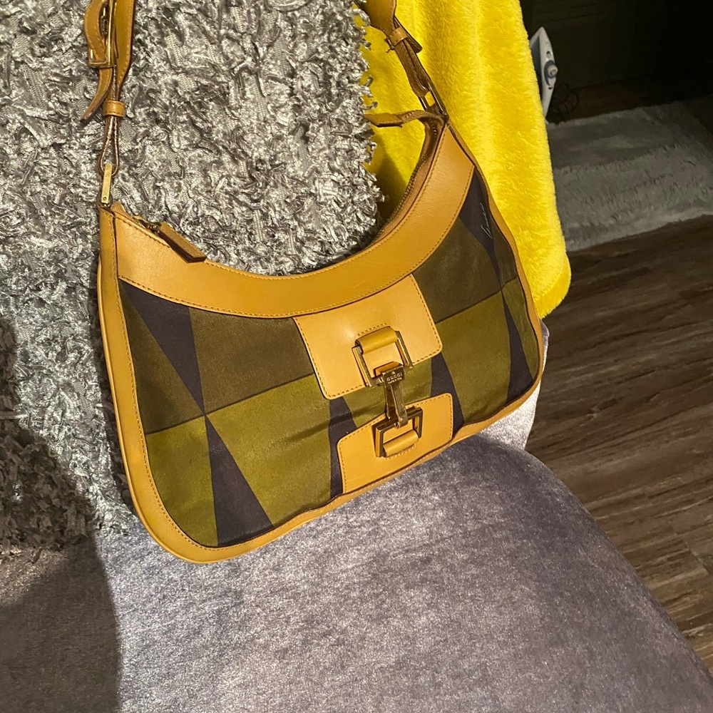 Authentic Vintage Jackie O Hobo Gucci Bag Leather & silk material. Gold hardware